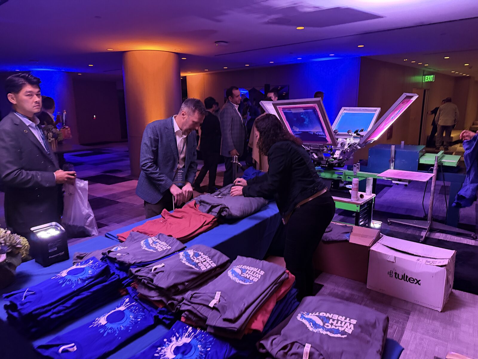 Executive merch table with curated finished pieces